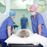 Operating theatre with nurses and surgeon
